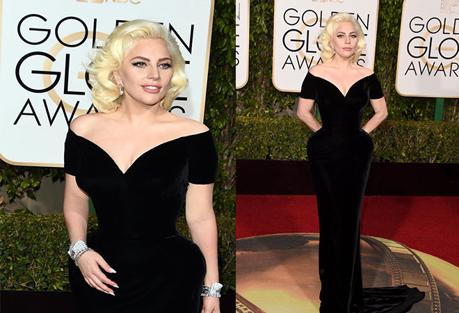 Siyah elbisesi ve ihtişamlı mücevherleri ile 2016 Altın Küre ödül töreninde Lady Gaga.