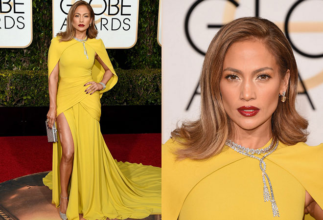 2016 Altın Küre ödül töreninde sarı ve derin yırtmaçlı kıyafeti ile Jennifer Lopez.